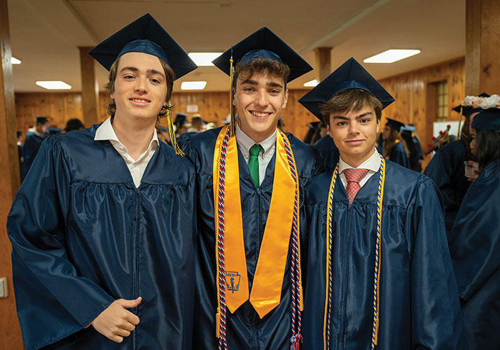 Photo of students in cap and gown. Links to Beneficiary Designations